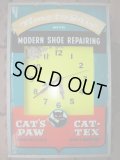 1950'S CAT'S PAW ADVERTISING LIGHTED SIGN CLOCK