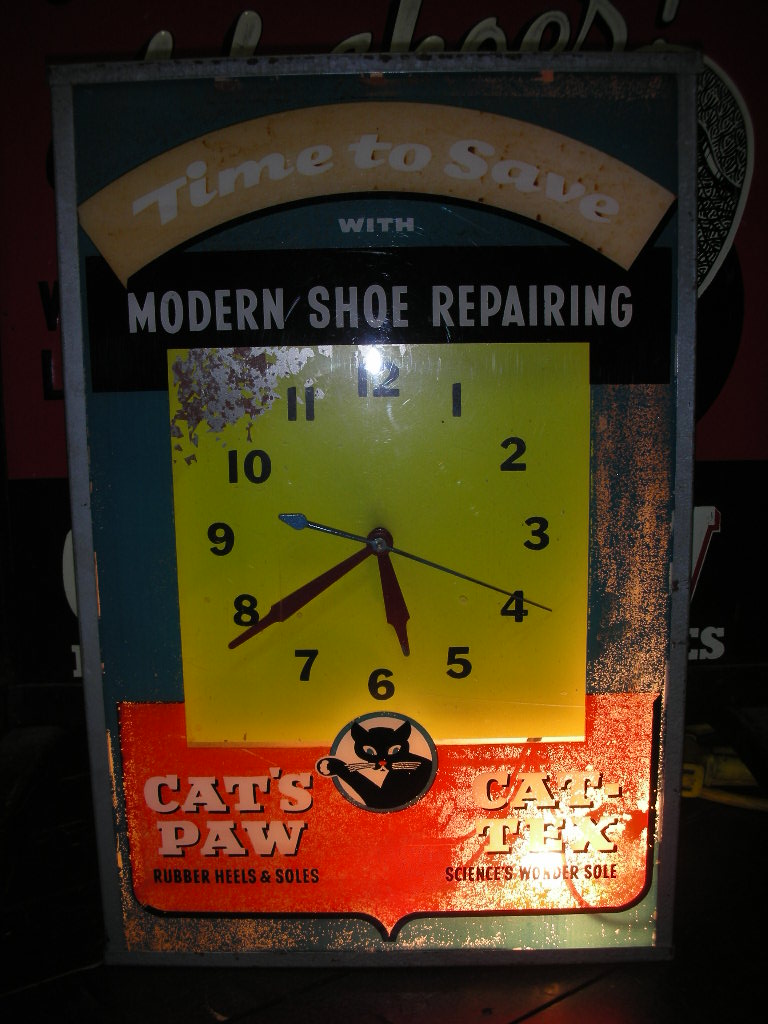 1950'S CAT'S PAW ADVERTISING LIGHTED SIGN CLOCK - ROCK-A-HULA Vintage  Clothing